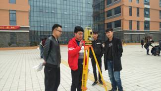 E:\城市学院\技能竞技部\图片资料\2017年3月走访调研\城建学院赛事指导 (2).jpg
